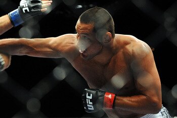 LAS VEGAS - JULY 11:  (R-L) Dan Henderson connects with a right to Mike Bisping during their middleweight bout during UFC 100 on July 11, 2009 in Las Vegas, Nevada.  (Photo by Jon Kopaloff/Getty Images)