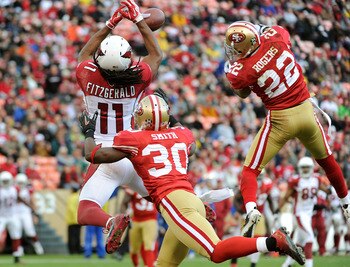49ers cornerback Carlos Rogers has been a pleasant surprise, while safety Reggie Smith has been hit-or-miss.