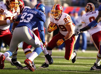 EAST RUTHERFORD, NJ - DECEMBER 18:   Roy Helu #29 of the Washington Redskins runs with the ball against the New York Giants during their game at MetLife Stadium on December 18, 2011 in East Rutherford, New Jersey.  (Photo by Al Bello/Getty Images)