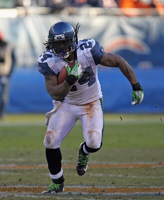 CHICAGO, IL - DECEMBER 18:  Marshawn Lynch #24 of the Seattle Seahawks runs against the Chicago Bears at Soldier Field on December18, 2011 in Chicago, Illinois. The Seahawks defeated the Bears 38-14.  (Photo by Jonathan Daniel/Getty Images)