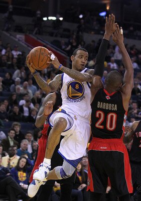 Monta Ellis delivers a pass during a blowout win for Golden State.