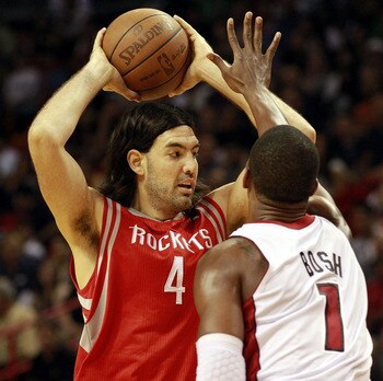 Luis Scola looks to pass during the Rockets' 125-119 loss to Miami.