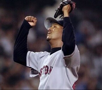 Pedro celebrates his 17th strikeout of the night which also ended the game at Yankee Stadium
