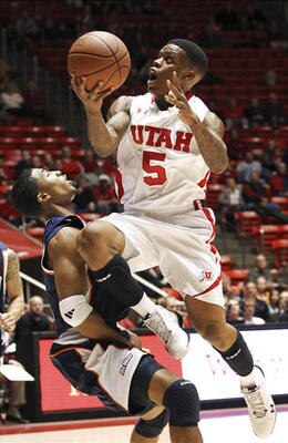 Utah-guard-kareem-storey-is-fouled-by-cal-state_display_image