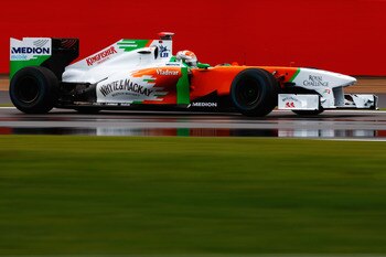 Thanks Force India, for ruining my slideshow's photo sequence with to your lack of conspicuous car number.  This is Adrian Sutil, car 14.