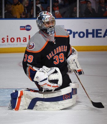 UNIONDALE, NY - NOVEMBER 23:  Rick DiPietro #39 of the New York Islanders skates in warmups prior to the game against the Philadelphia Flyers at the Nassau Veterans Memorial Coliseum on November 23, 2011 in Uniondale, New York.  (Photo by Bruce Bennett/Ge