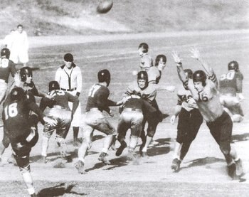Villanova (dark) punts the ball against Auburn (light) in Havana.