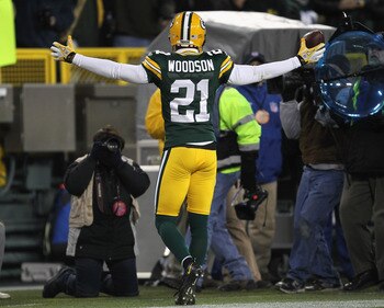 As you can clearly see, there is no wall up against the back of Charles Woodson and the Green Bay Packers.
