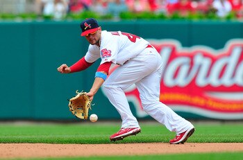 ST. LOUIS, MO - JUNE 19: Pete Kozma #47 of the St. Louis Cardinals fields a ground ball against the Kansas City Royals at Busch Stadium on June 19, 2011 in St. Louis, Missouri.  (Photo by Jeff Curry/Getty Images)