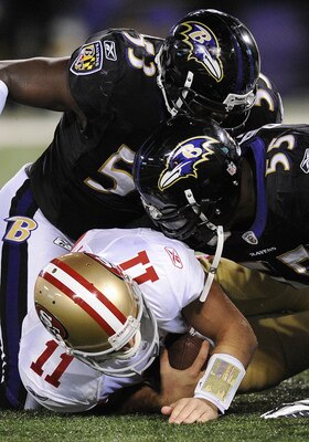 Jameel McCLain, Terrell Suggs, and Alex Smith