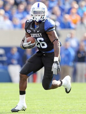 LEXINGTON, KY - NOVEMBER 26:  CoShik Williams #26 of the Kentucky Wilcats runs with the ball during the game against the Tennessee Volunteers at Commonwealth Stadium on November 26, 2011 in Lexington, Kentucky.  Kentucky won 10-7.  (Photo by Andy Lyons/Ge