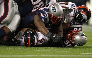 Vince Wilfork (75) and the Pats' D buried Tebow and the Broncos in the AFC Divisional Playoffs.