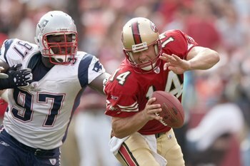 J.T. O'Sullivan tries to escape pressure during the 49ers 30-21 loss to the Patriots.