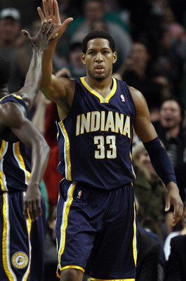 BOSTON, MA - JANUARY 06: Danny Granger #33 of the Indiana Pacers is congratulated by teammate Darren Collison #3 after Granger drew the foul in the second half against the Boston Celtics on January 6, 2012 at TD Garden in Boston, Massachusetts. The Indian