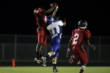 Nate Dortch (#8) intercepts pass.