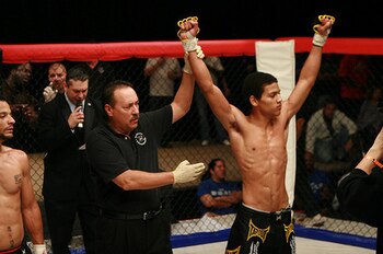 Alex Caceres (right); photo cred: MMABay.co.uk