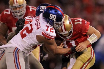 Osi Umenyiora (72) is one of three former Troy Trojans playing on Super Sunday this season.