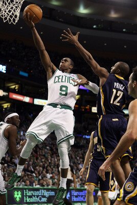 BOSTON, MA - JANUARY 06:  Rajon Rondo #9 of the Boston Celtics goes up for the shot as A.J. Price #12 of the Indiana Pacers defends on January 6, 2012 at TD Garden in Boston, Massachusetts. The Indiana Pacers defeated the Boston Celtics 87-74. NOTE TO USE