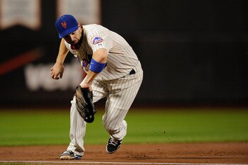 NEW YORK, NY - SEPTEMBER 27:  David Wright #5 of the New York Mets fields a ball against the Cincinnati Reds in the third inning of a game at Citi Field on September 27, 2011 in the Flushing neighborhood of the Queens borough of New York City.  (Photo by 
