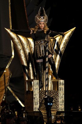 INDIANAPOLIS, IN - FEBRUARY 05:  Singer Madonna performs during the Bridgestone Super Bowl XLVI Halftime Show at Lucas Oil Stadium on February 5, 2012 in Indianapolis, Indiana.  (Photo by Andy Lyons/Getty Images)