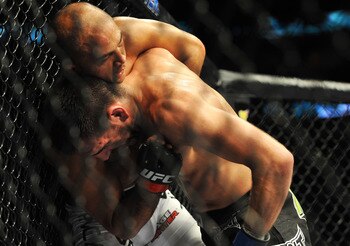 Kenny Florian wrestles against BJ Penn.