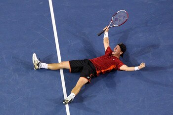 MELBOURNE, AUSTRALIA - JANUARY 21:  Lleyton Hewitt of Australia celebrates winning his third round match against Milos Raonic of Canada during day six of the 2012 Australian Open at Melbourne Park on January 21, 2012 in Melbourne, Australia.  (Photo by Ry