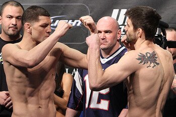 Nick Diaz (left) squaring off with Carlos Condit/ photo cred: Scott Petersen for MMAWeekly.com
