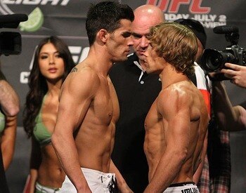 Dominick Cruz (left) staring down rival Urijah Faber/ photo cred: Scott Petersen for MMAWeekly.com