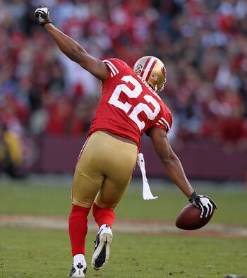Carlos Rogers rejoices that he isn't wearing a Washington Redskins jersey..