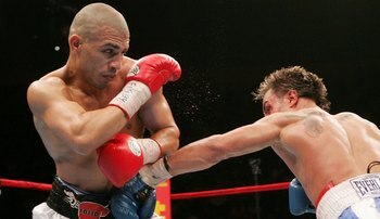 Cotto defending against Malignaggi
