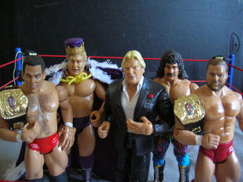 The Heenan Family, once proud owners of two titles at once.