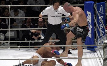 Silva (right) readying a kick to the face of Fujita/ Sherdog.com