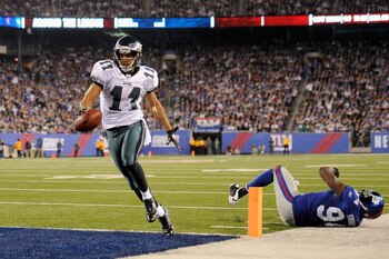 EAST RUTHERFORD, NJ - NOVEMBER 20:  Steve Smith #11 of the Philadelphia Eagles scores on a 14-yard touchdown pass in the second quarter against Mathias Kiwanuka #94 of the New York Giants at MetLife Stadium on November 20, 2011 in East Rutherford, New Jer