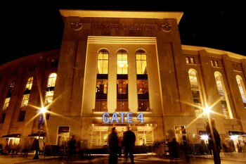 NEW YORK - OCTOBER 25:  Patrons stand outside of Gate 4 at Yankee Stadium before Game Six of the ALCS between the New York Yankees and the Los Angeles Angels during the 2009 MLB Playoffs at Yankee Stadium on October 25, 2009 in the Bronx borough of New Yo