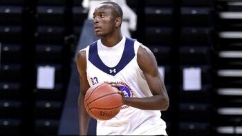 http://www.bet.com/content/betcom/news/sports/2011/07/18/top-high-school-recruit-gets-pulled-from-game-by-his-mom/_jcr_content/featuredMedia/newsitemimage.newsimage.dimg/071811-news-sports-devonta-pollard.jpg