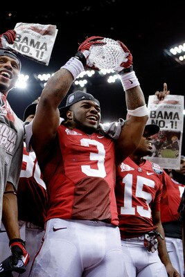 NEW ORLEANS, LA - JANUARY 09:  Trent Richardson #3 of the Alabama Crimson Tide celebrates with the trophy after defeating Louisiana State University Tigers in the 2012 Allstate BCS National Championship Game at Mercedes-Benz Superdome on January 9, 2012 i