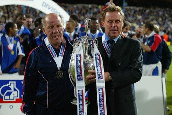 Redknapp and his assistant Jim Smith hold the Division One title aloft in 2003.