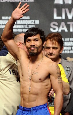 Pacuqiao at the weigh in for his bout with Juan Manuel Marquez