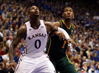 LAWRENCE, KS - JANUARY 16:  Thomas Robinson #0 of the Kansas Jayhawks and Perry Jones III #1 of the Baylor Bears box out during the game on January 16, 2012 at Allen Fieldhouse in Lawrence, Kansas.  (Photo by Jamie Squire/Getty Images)