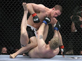 Almeida (top)/ Jeff Cain for MMAWeekly.com