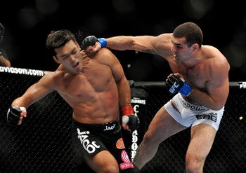 Mauricio "Shogun" Rua (R) connects with a right hand