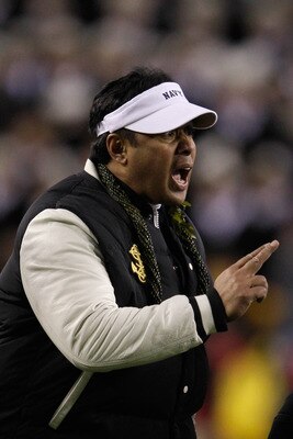 LANDOVER, MD - DECEMBER 10:  Head coach Ken Niumatalolo of the Navy Midshipmen motions to the field during the second half against the Army Black Knights at FedEx Field on December 10, 2011 in Landover, Maryland.  (Photo by Rob Carr/Getty Images)