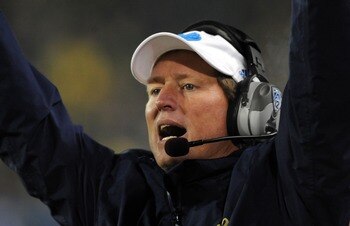 EUGENE, OR - DECEMBER 02 : Head coach Rick Neuheisel of the UCLA Bruins celebrates as the Bruins score a touchdown in the fourth quarter of the Pac-12 Championship against Oregon Ducks at Autzen Stadium on December 2, 2011 in Eugene, Oregon. It was Neuhei