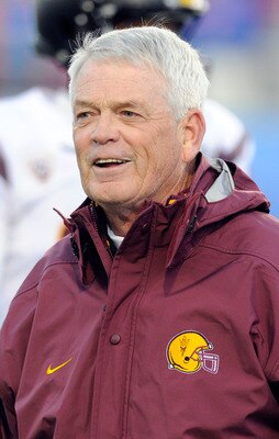 LAS VEGAS, NV - DECEMBER 22:  Head coach Dennis Erickson of the Arizona State Sun Devils watches his team warm up before playing the Boise State Broncos in the MAACO Bowl Las Vegas at Sam Boyd Stadium December 22, 2011 in Las Vegas, Nevada. Boise State wo