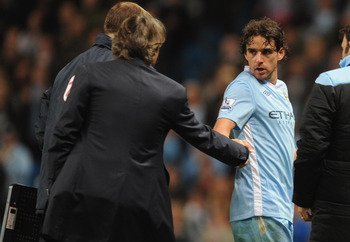 MANCHESTER, ENGLAND - SEPTEMBER 21:  Owen Hargreaves of Manchester City is subbed by manager Roberto Mancini during the Carling Cup Third Round match between Manchester City and Birmingham City at the Etihad Stadium on September 21, 2011 in Manchester, En