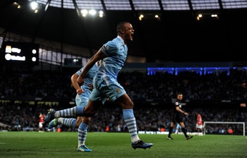 Vincent Kompany celebrates scoring v Man U
