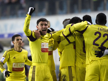 KHIMKI, RUSSIA - MARCH 05: Yuri Zhirkov of FC Anzhi Makhachkala celebrates after scoring a goal during the Russian Football League Championship match between FC Dynamo Moscow and FC Anzhi Makhachkala at the Arena Khimki Stadium on March 05, 2012 in Khimki