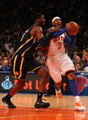 NEW YORK, NY - MARCH 16: Carmelo Anthony #7 of the New York Knicks goes to the basket against Roy Hibbert #55 of the Indiana Pacers during their game at Madison Square Garden on March 16, 2012 in New York City. (Photo by Al Bello/Getty Images)