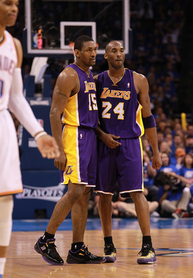 OKLAHOMA CITY, OK - MAY 21: Kobe Bryant #24 of the Los Angeles Lakers and Metta World Peace #15 during Game Five of the Western Conference Semifinals of the 2012 NBA Playoffs at Chesapeake Energy Arena on May 21, 2012 in Oklahoma City, Oklahoma. NOTE TO