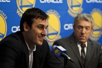 Andrew Bogut will bring a presence to the frontcourt.